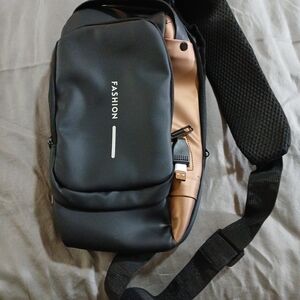 Black and Brown Crossbody Bag with Sleek Design
